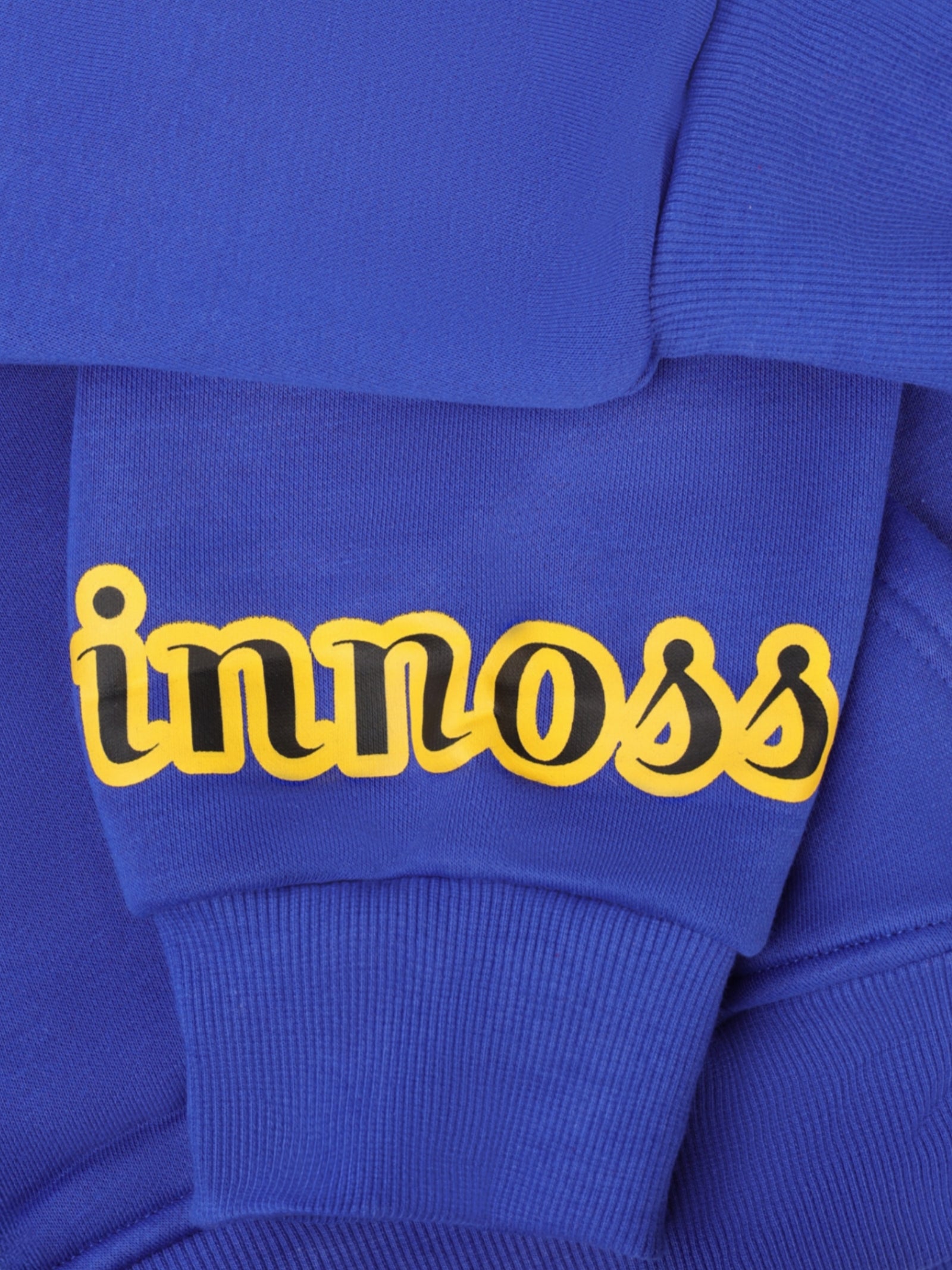 Blue oversized hoodie with dropped shoulders and front logo